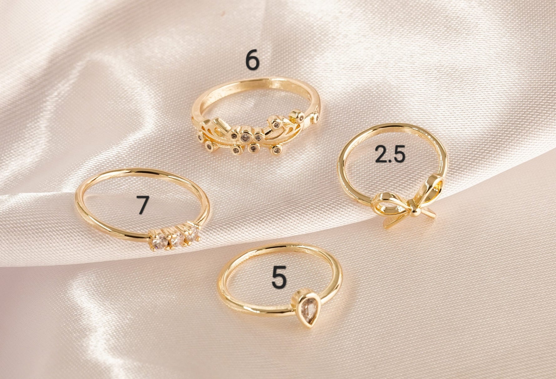 Set X 4 Anillos Cristal Moño Dorados Ref: J129