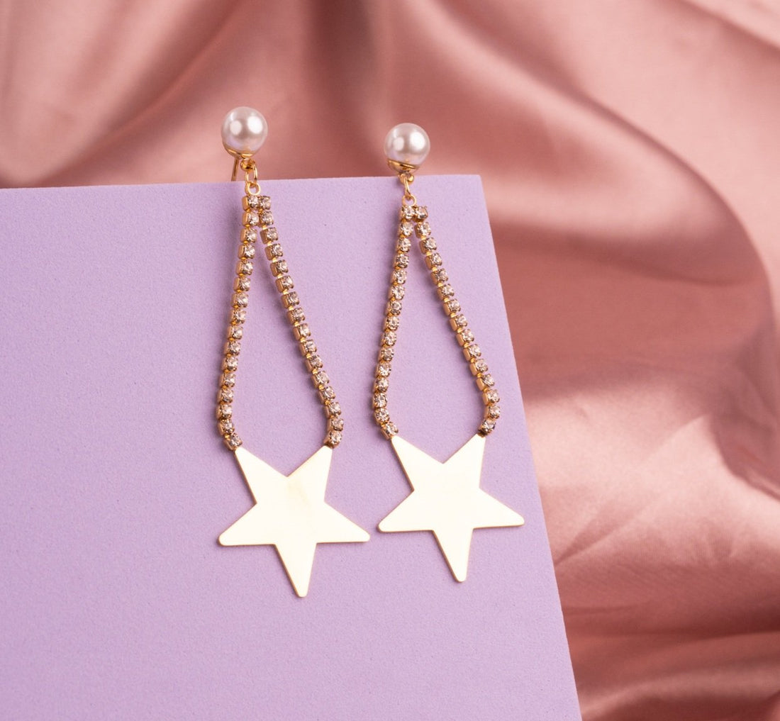 Aretes Estrellas Circones Dorados Ref: B584