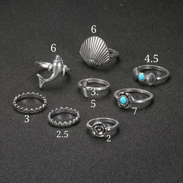 Set X 8 Anillos Concha Delfín 967: Ref