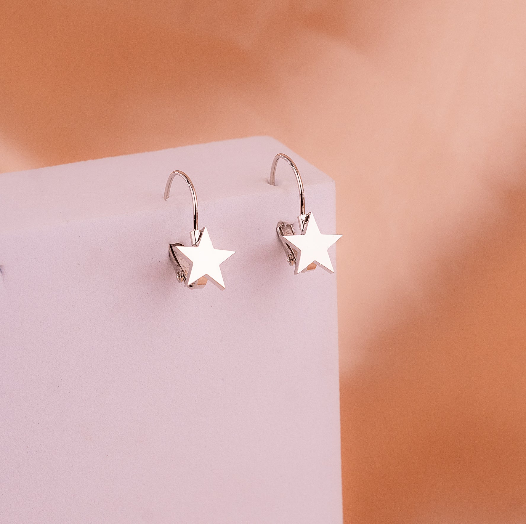 Aretes Estrellas Gancho Plateados Ref: B343